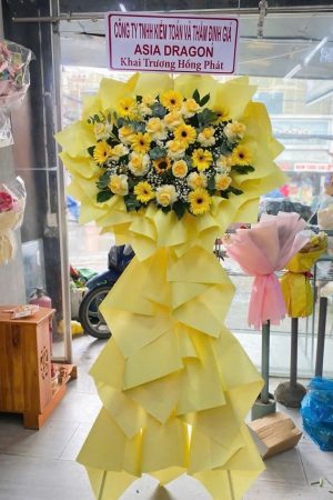 Kệ hoa hồng vàng mix đồng tiền