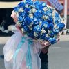 Bó hoa hồng xanh độc đáo, ấn tượng và tượng trưng cho tình yêu vĩnh cửu, hy vọng và niềm tin.